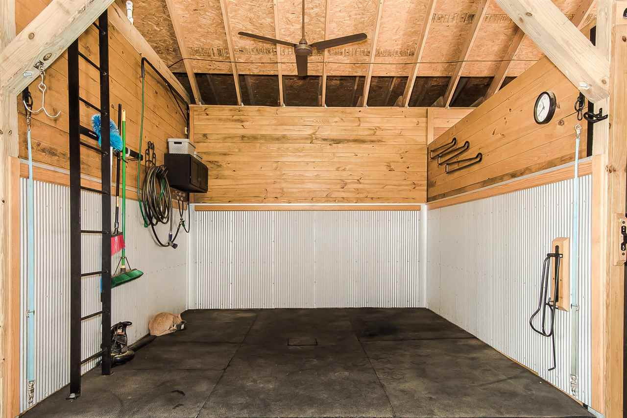 1522 Freedom Road Smithfield, NC 27577 - Photo 17 of 25 12’x12’ with hot /cold water with overhead sprayer; 3 blanket hangers; saddle rack; cross ties; custom ladder to loft; Rubbermaid organizer; supply cabinet. Wash Rack