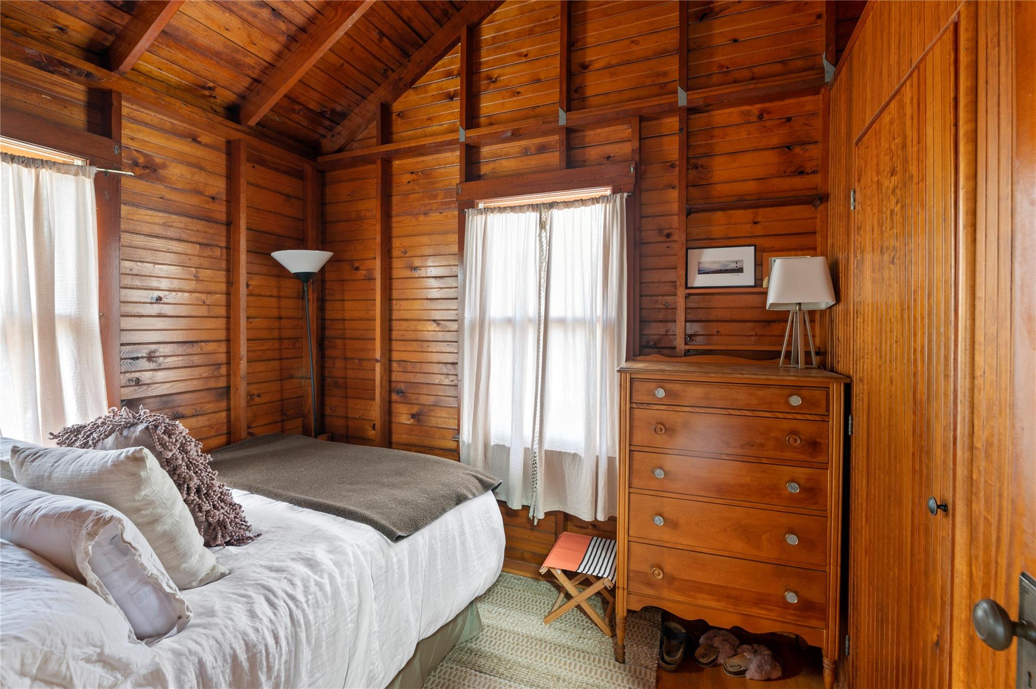 760 Surf Road Ocean Beach, NY 11770 - Photo 7 of 16 Bedroom featuring vaulted ceiling with beams, wooden walls, and wood ceiling