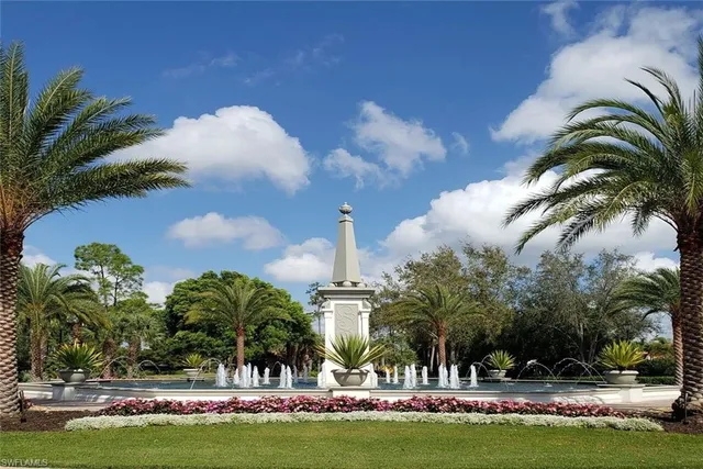 a view of a park with palm trees