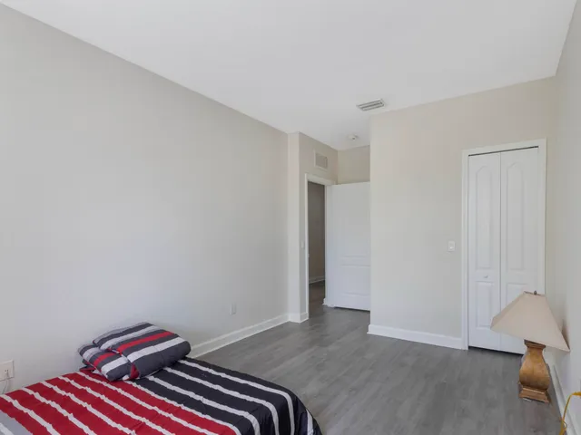 a room with a bed and a chair