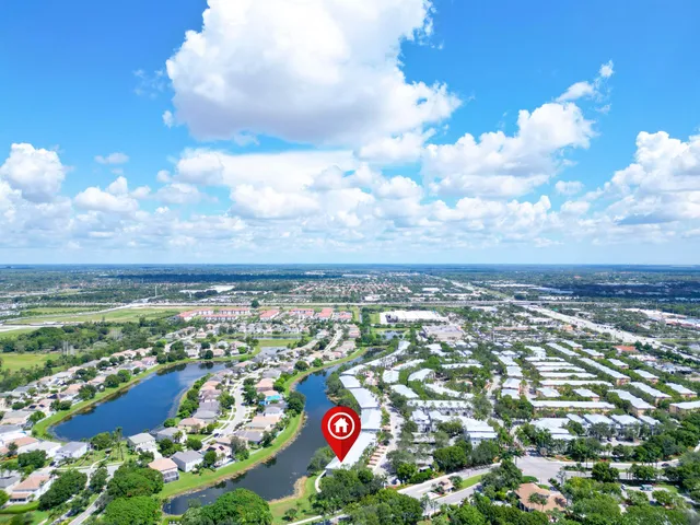 an aerial view of residential house with an outdoor space