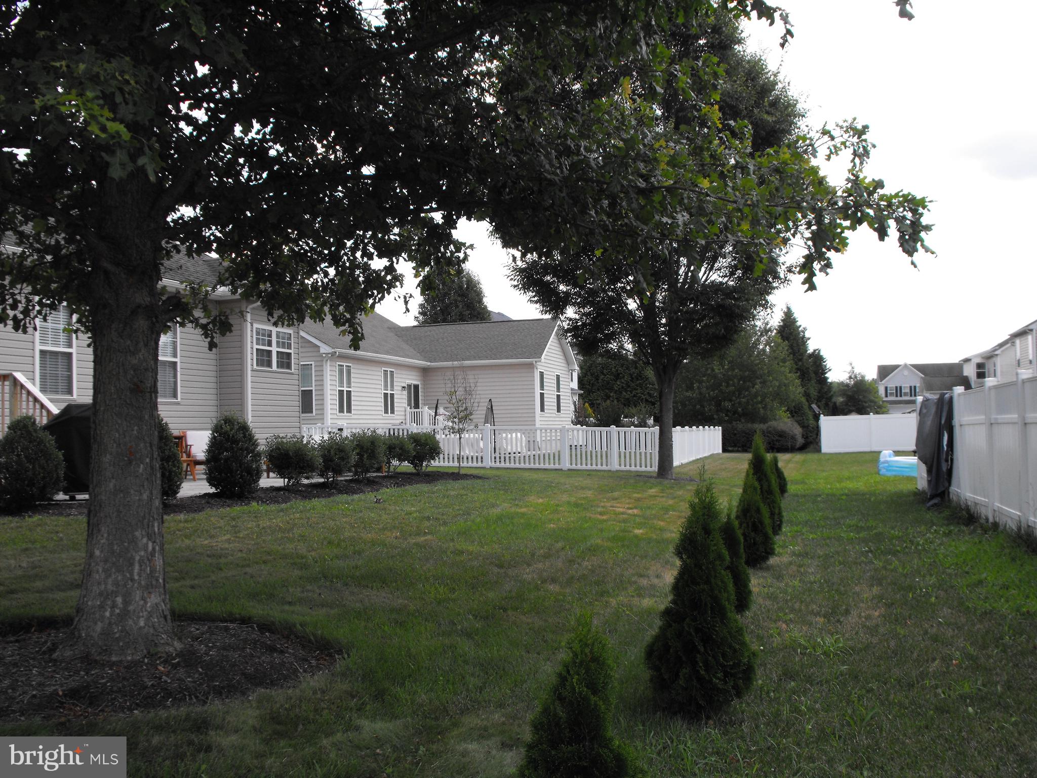 30 Brittingham Drive Dover, DE 19904 - Photo 31 of 36 a front view of a house with garden