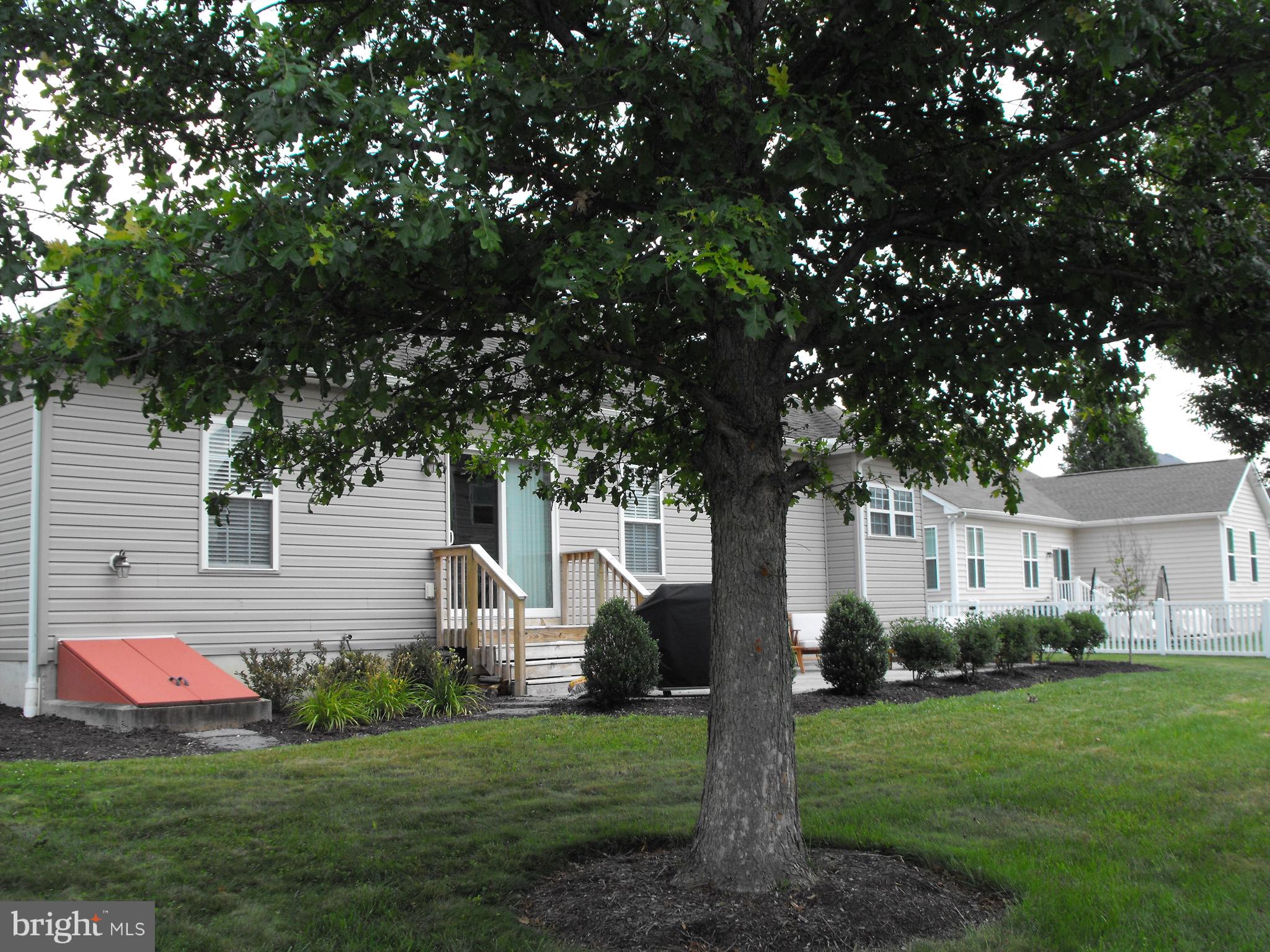30 Brittingham Drive Dover, DE 19904 - Photo 32 of 36 a front view of house with yard and green space