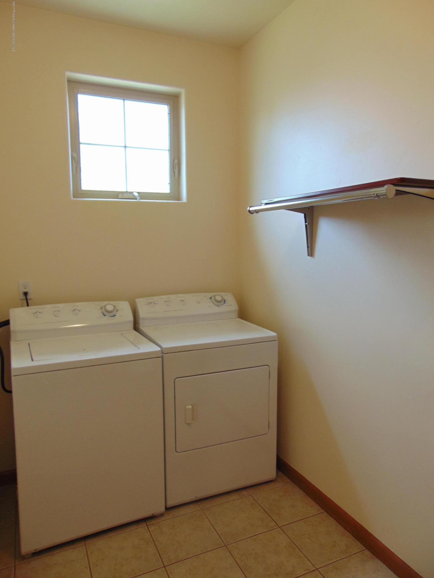 1193 East 19th Street Rifle, CO 81650 - Photo 17 of 40 a utility room with dryer and washer