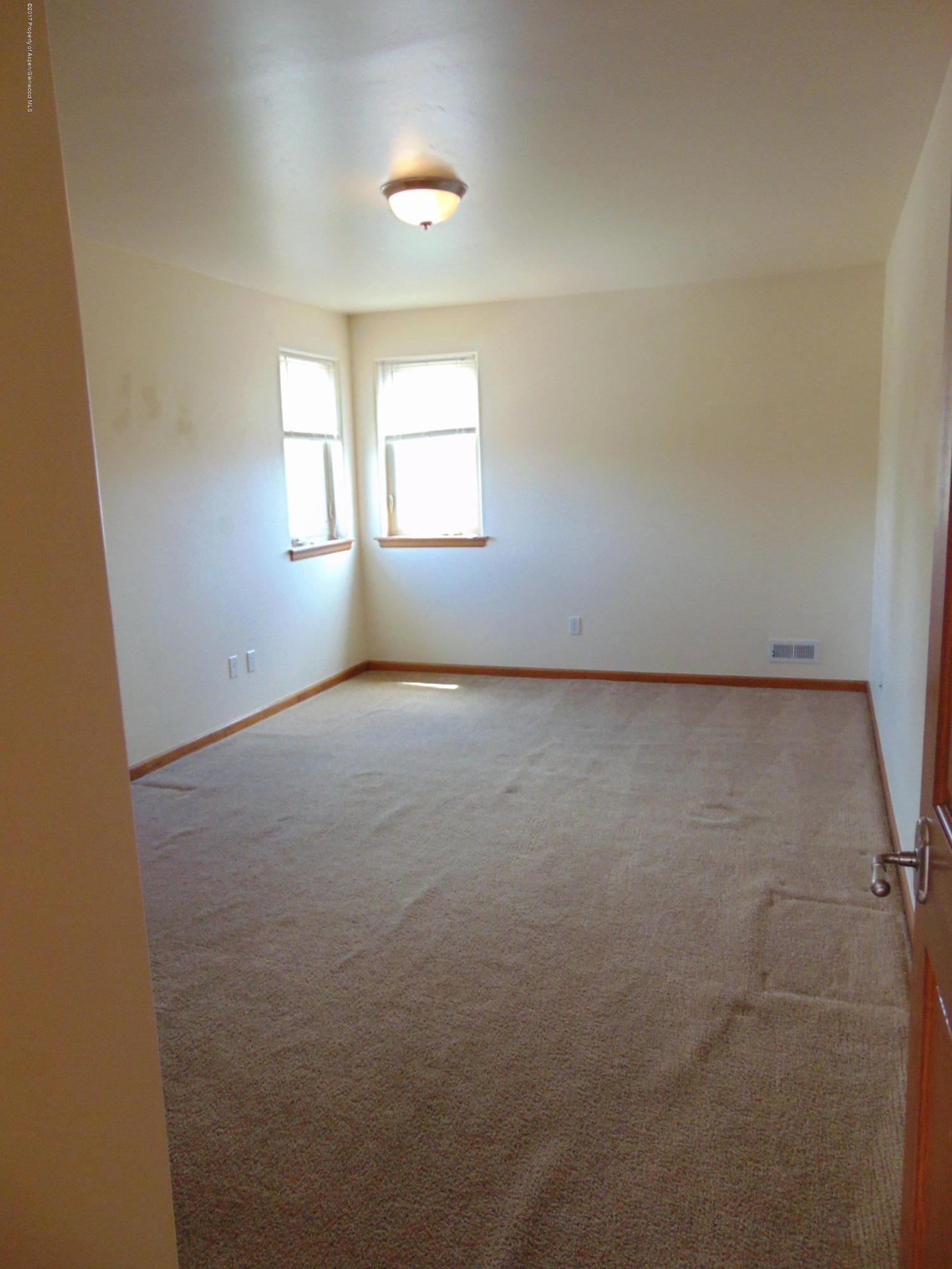 1193 East 19th Street Rifle, CO 81650 - Photo 29 of 40 an empty room with windows