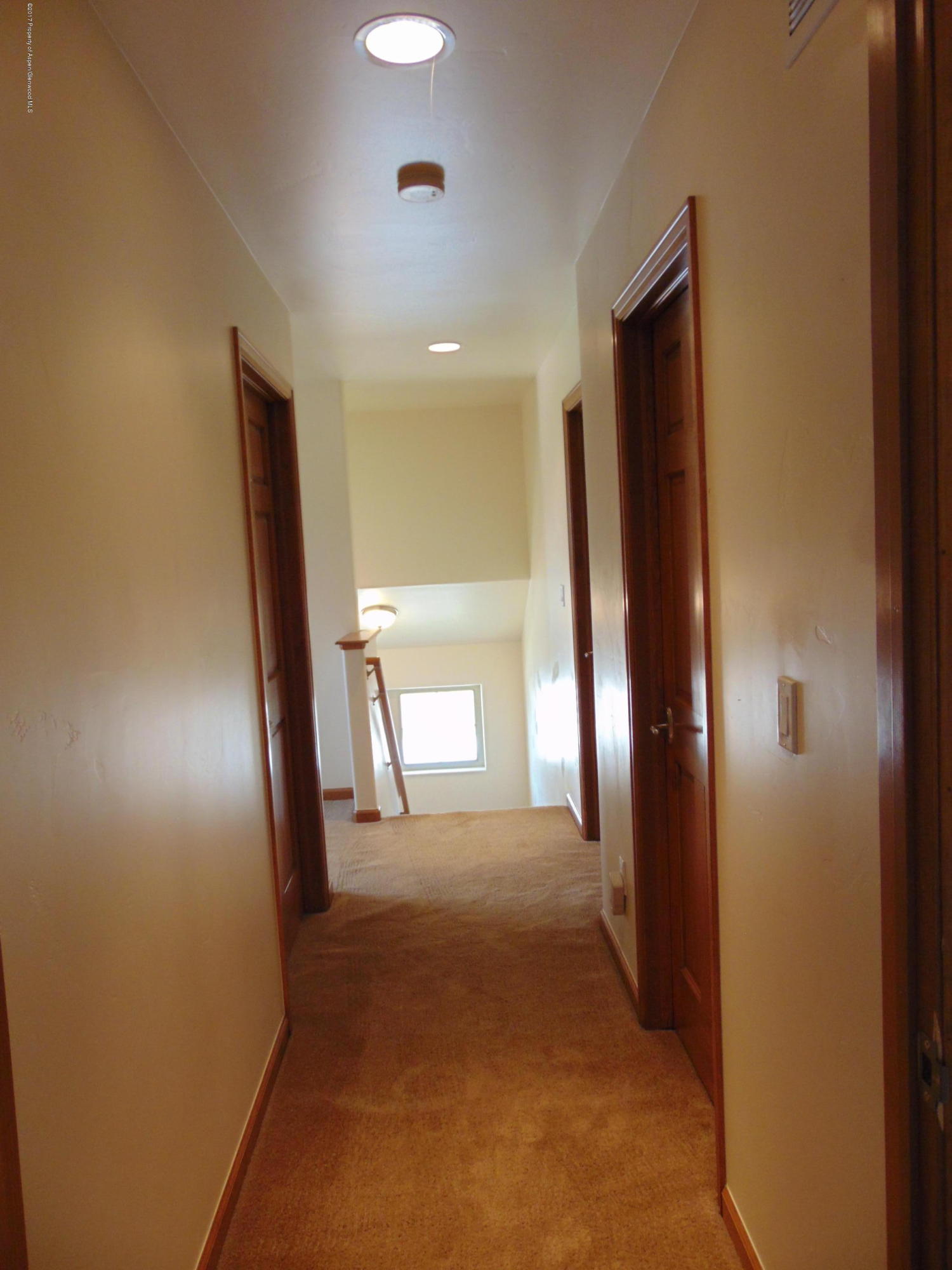 1193 East 19th Street Rifle, CO 81650 - Photo 38 of 40 a view of a hallway with a livingroom and a bathroom
