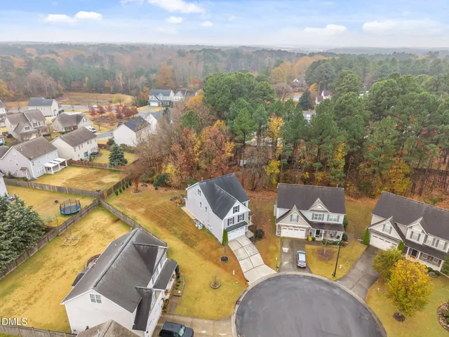 a view of a balcony with floor to ceiling windows