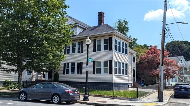 a car parked in front of a building