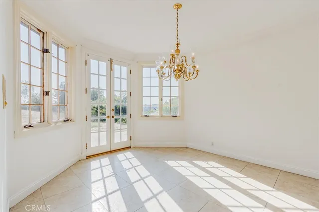 a spacious bathroom with a granite countertop tub sink and mirror