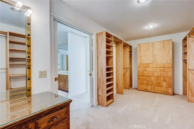 a view of a hallway with closet