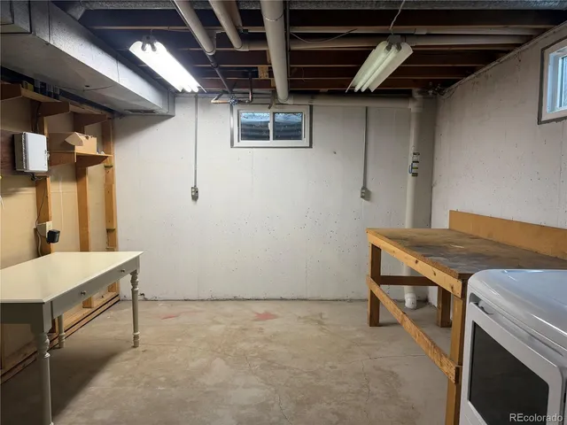 a bathroom with double vanity and a shower