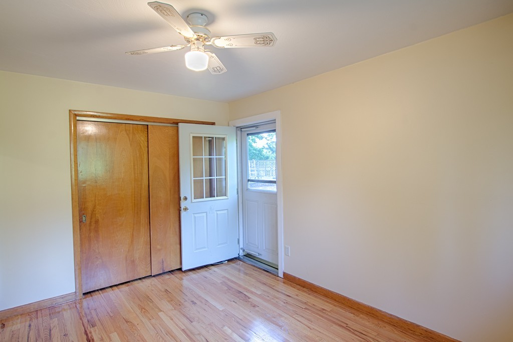 62 Lindsay Road Springfield, MA 01128 - Photo 18 of 27 wooden floor in an empty room with a window