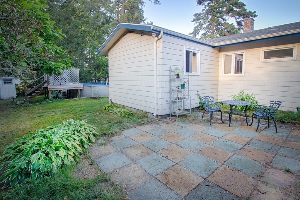 62 Lindsay Road Springfield, MA 01128 - Photo 22 of 27 a view of backyard with a garden and plants