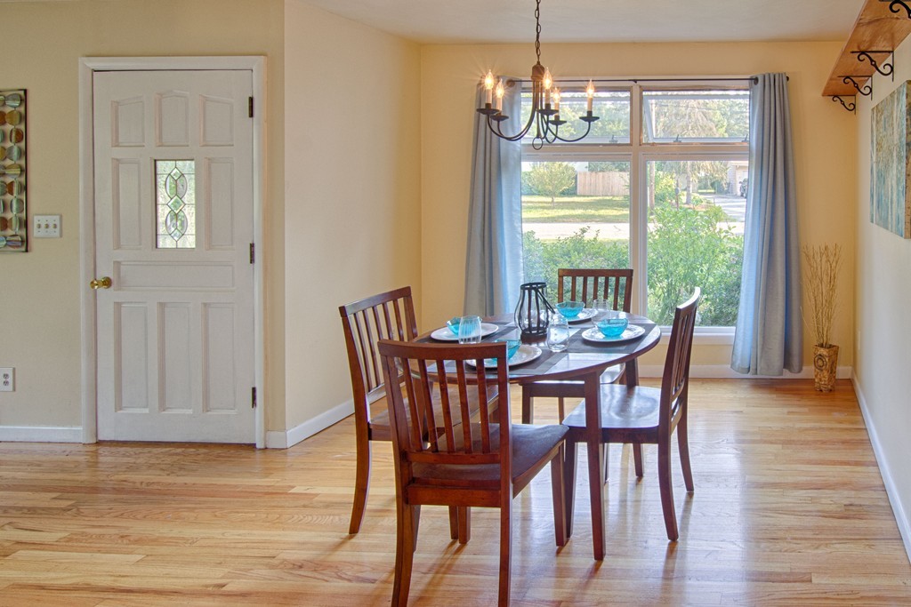 62 Lindsay Road Springfield, MA 01128 - Photo 8 of 27 a view of a dining room with furniture window and wooden floor