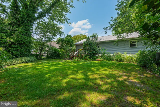 a view of a house with a garden