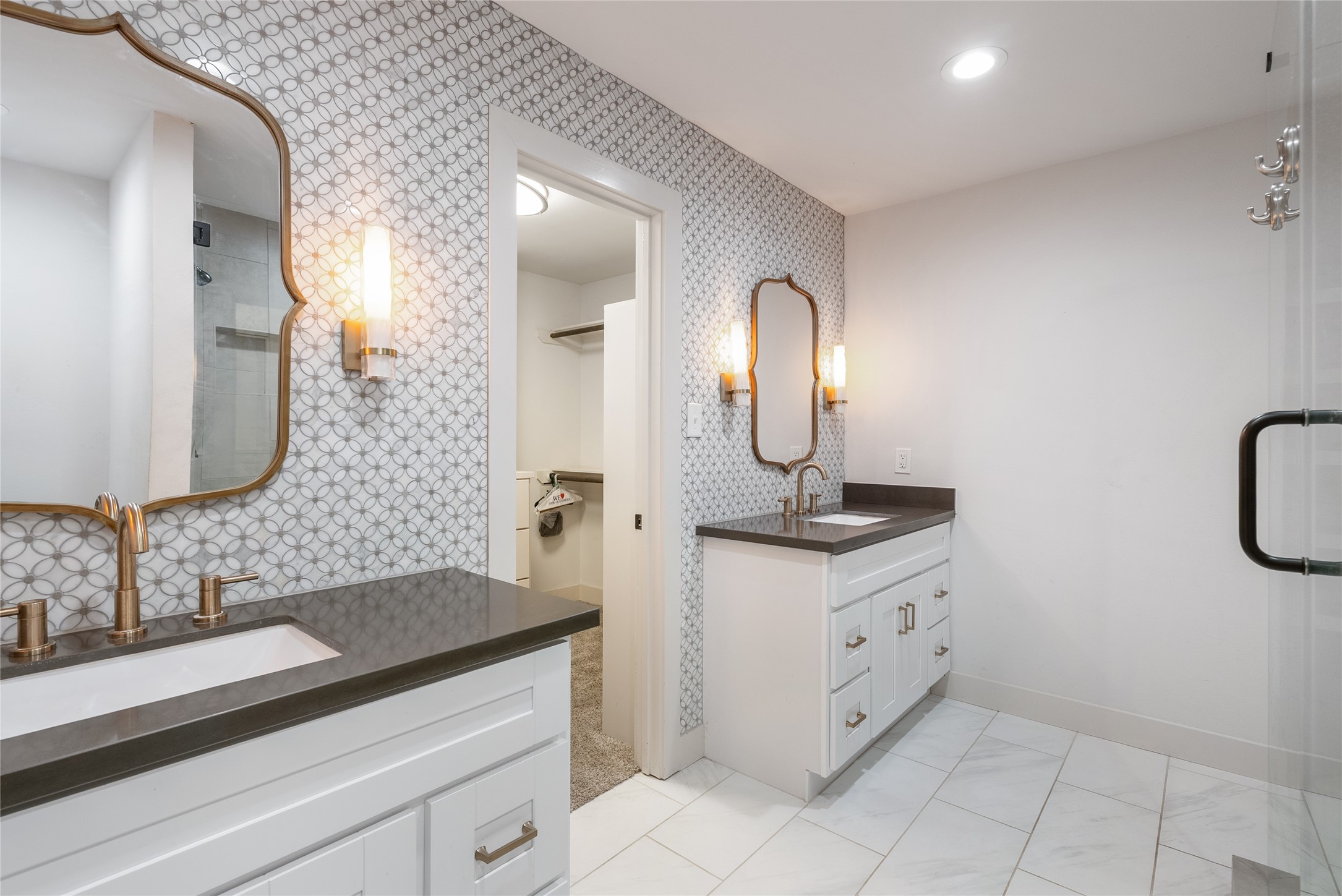7307 Raton Street Houston, TX 77055 - Photo 16 of 23 Dual sinks with expansive counter space offer convenience while getting ready in the morning!