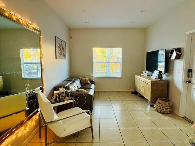 a room with furniture and a window