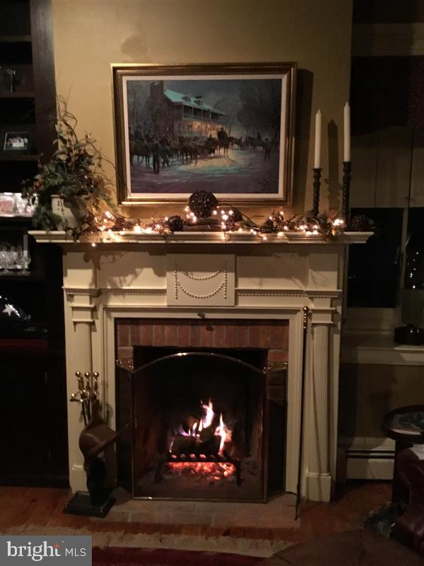 1-22020 Durberry Road Smithsburg, MD 21783 - Photo 122 of 138 a fireplace with a clock on top of it