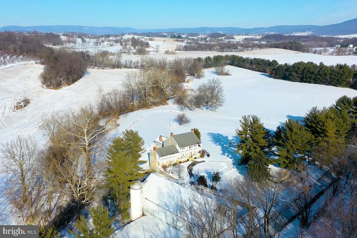 1-22020 Durberry Road Smithsburg, MD 21783 - Photo 2 of 138 a view of a lake with mountains in the background