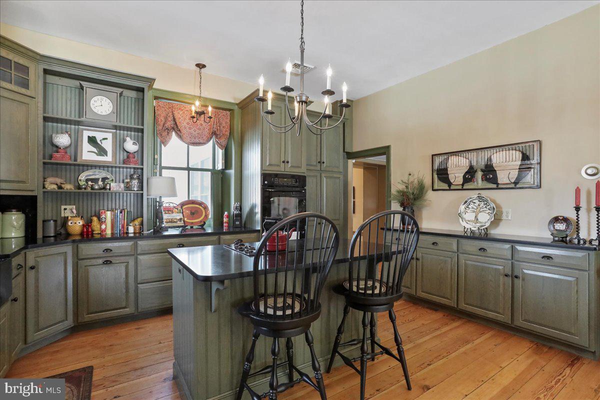 1-22020 Durberry Road Smithsburg, MD 21783 - Photo 60 of 138 a kitchen with chandelier dining table and chairs
