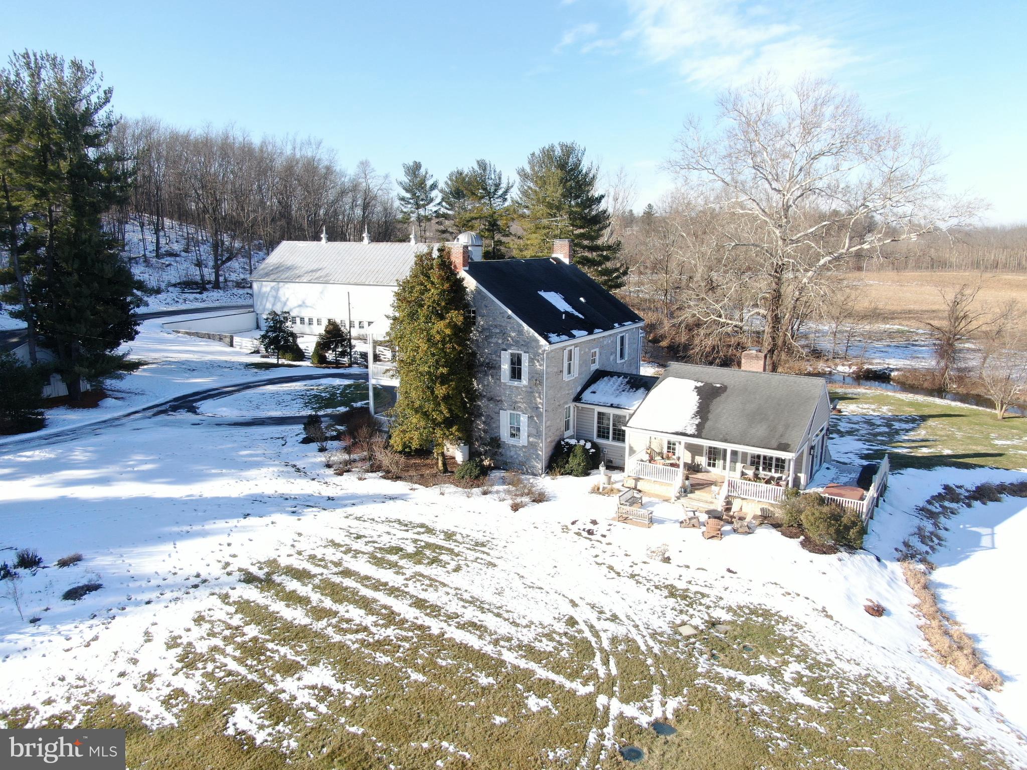 1-22020 Durberry Road Smithsburg, MD 21783 - Photo 7 of 138 a view of a house with a yard covered in snow