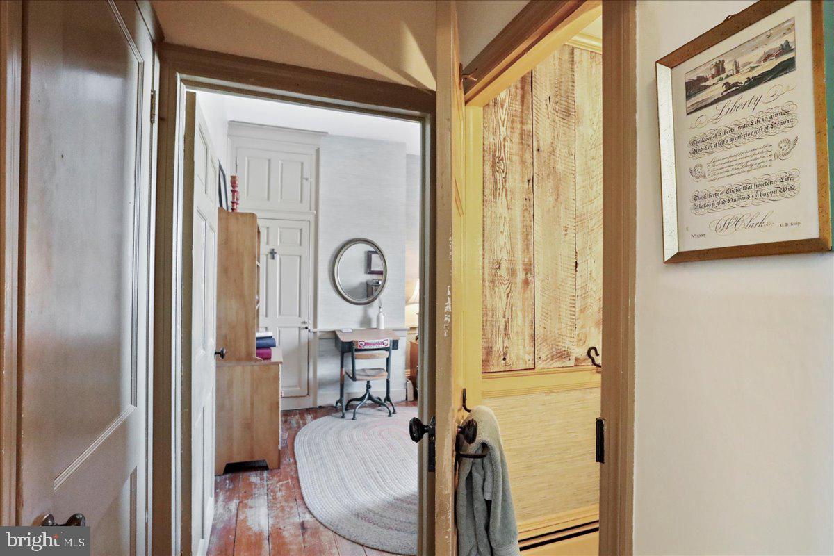 1-22020 Durberry Road Smithsburg, MD 21783 - Photo 89 of 138 a view of a hallway with wooden floor and entryway