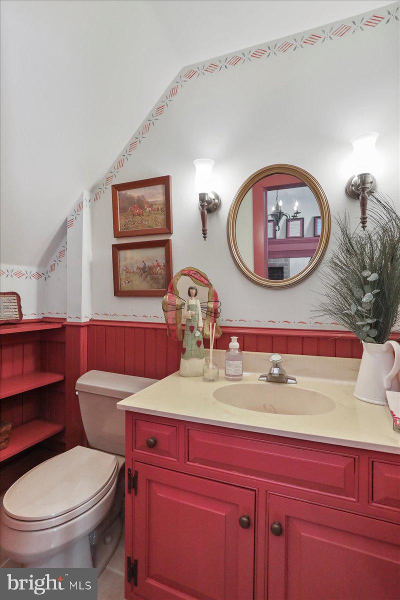 1-22020 Durberry Road Smithsburg, MD 21783 - Photo 97 of 138 a bathroom with a toilet a sink and a mirror