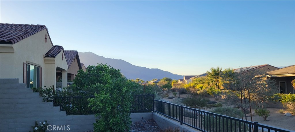 82 Burgundy Rancho Mirage, CA 92270 - Photo 31 of 42 Open walking path behind home - East
