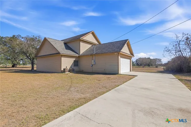a house with trees in front of it