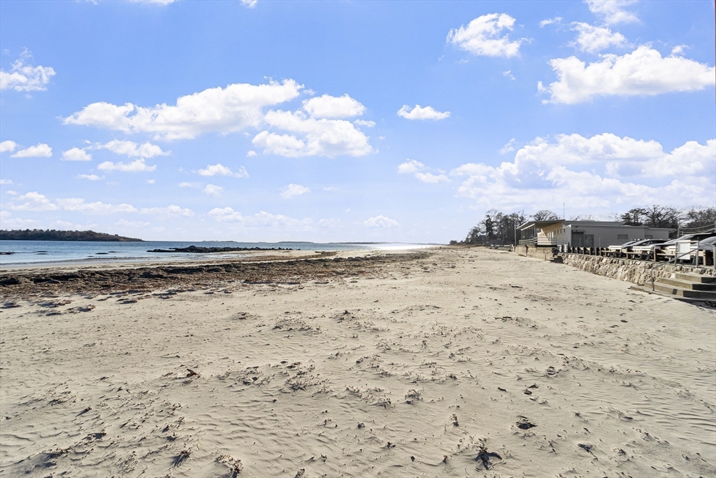 27 R West Street, Unit 8 Beverly, MA 01915 - Photo 20 of 21 a view of a dry yard with wooden fence