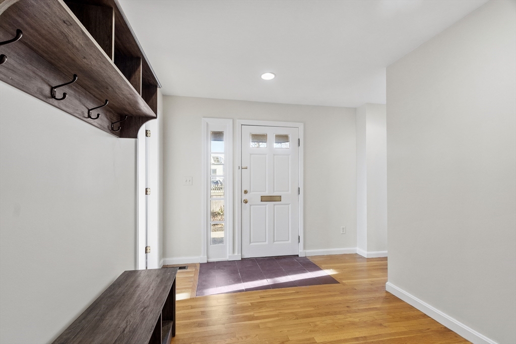 27 R West Street, Unit 8 Beverly, MA 01915 - Photo 8 of 21 a view of room with wooden floor
