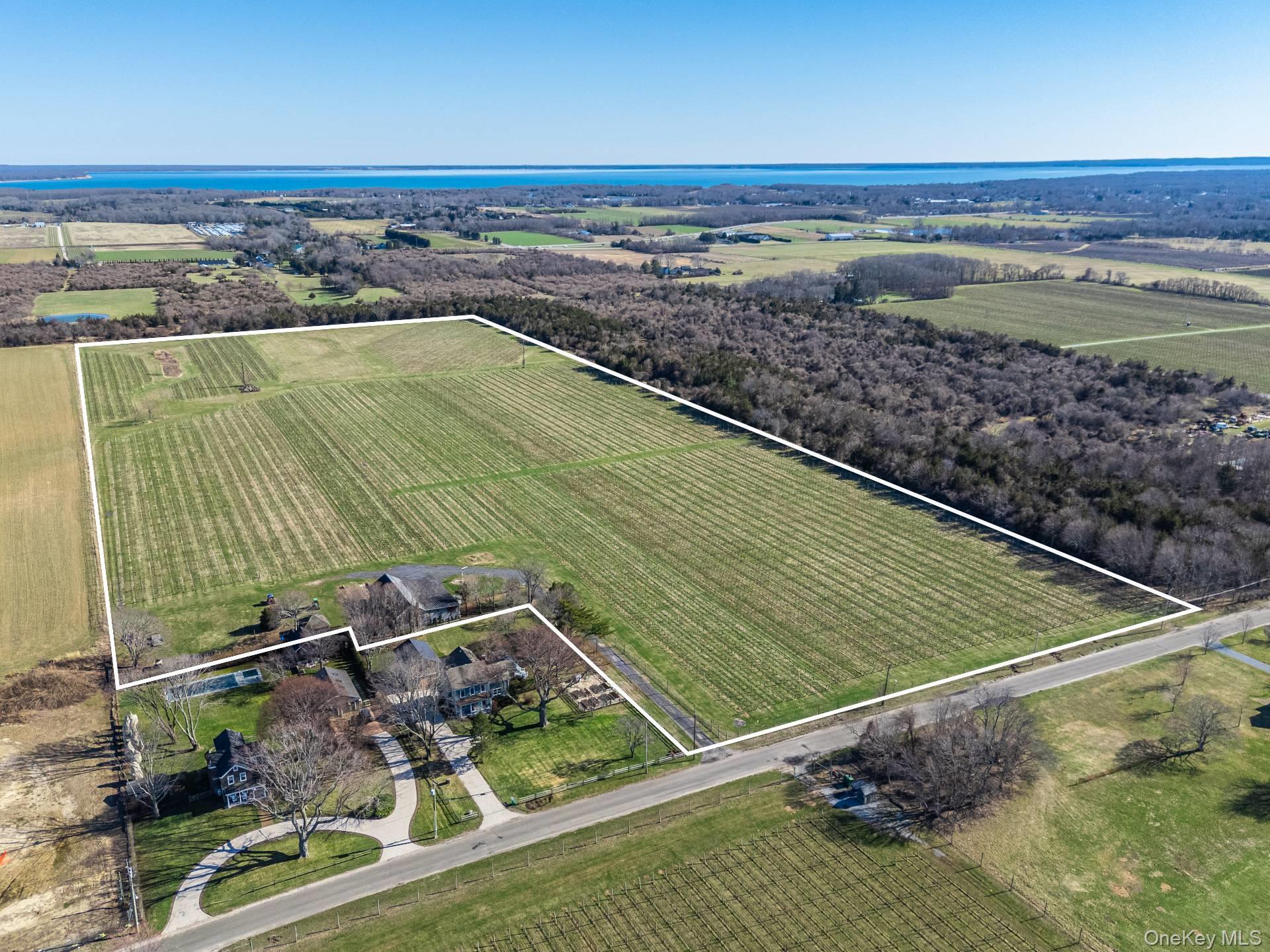 4100 Oregon Road Cutchogue, NY 11935 - Photo 3 of 17 a view of a room with wooden floor