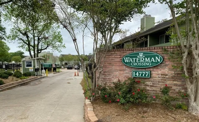 a view of a chairs with a table in backyard
