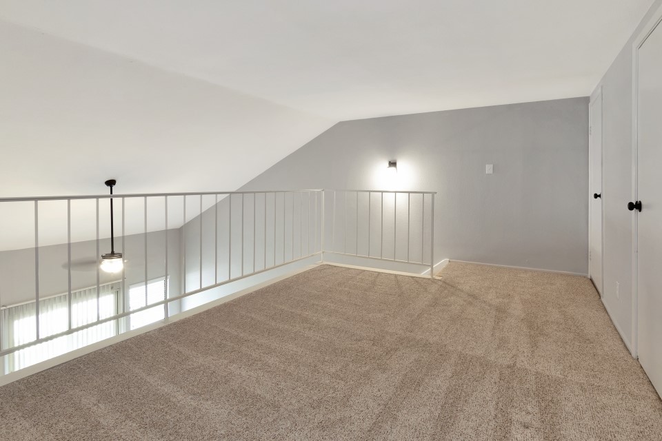 14777 Wunderlich Drive, Unit 1604 Houston, TX 77069 - Photo 17 of 19 a view of a hallway