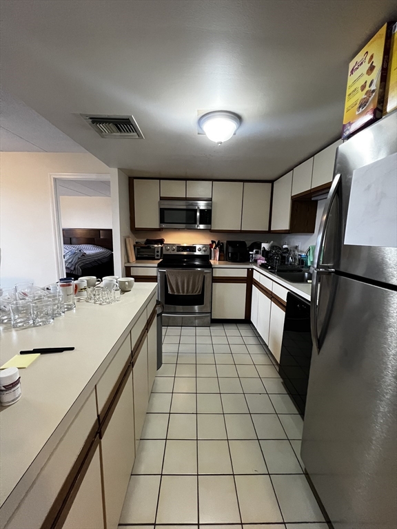 85 Brainerd Road, Unit 411 Boston, MA 02134 - Photo 1 of 15