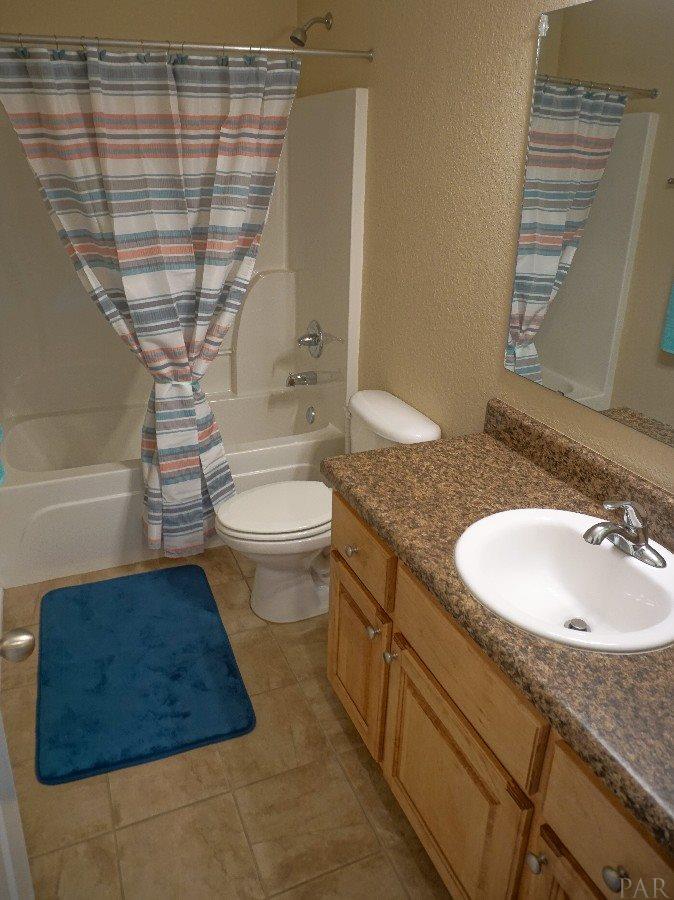 2795 Wallace Lake Road Pace, FL 32571 - Photo 18 of 25 This bath is shared with the 2nd and 3rd Bedroom