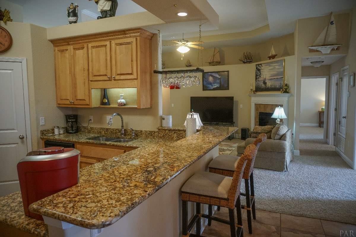 2795 Wallace Lake Road Pace, FL 32571 - Photo 9 of 25 Kitchen with Granite Countertops