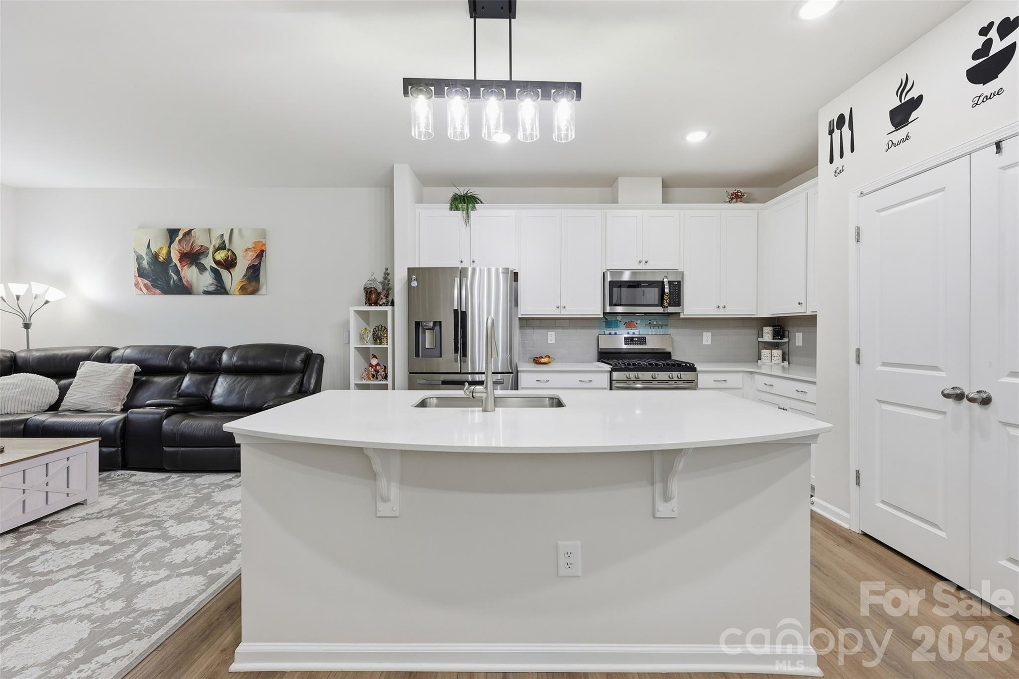 6029 Chelsea Oaks Ridge Fort Mill, SC 29708 - Photo 12 of 33 a view of kitchen with stainless steel appliances granite countertop a sink a stove a refrigerator and cabinets
