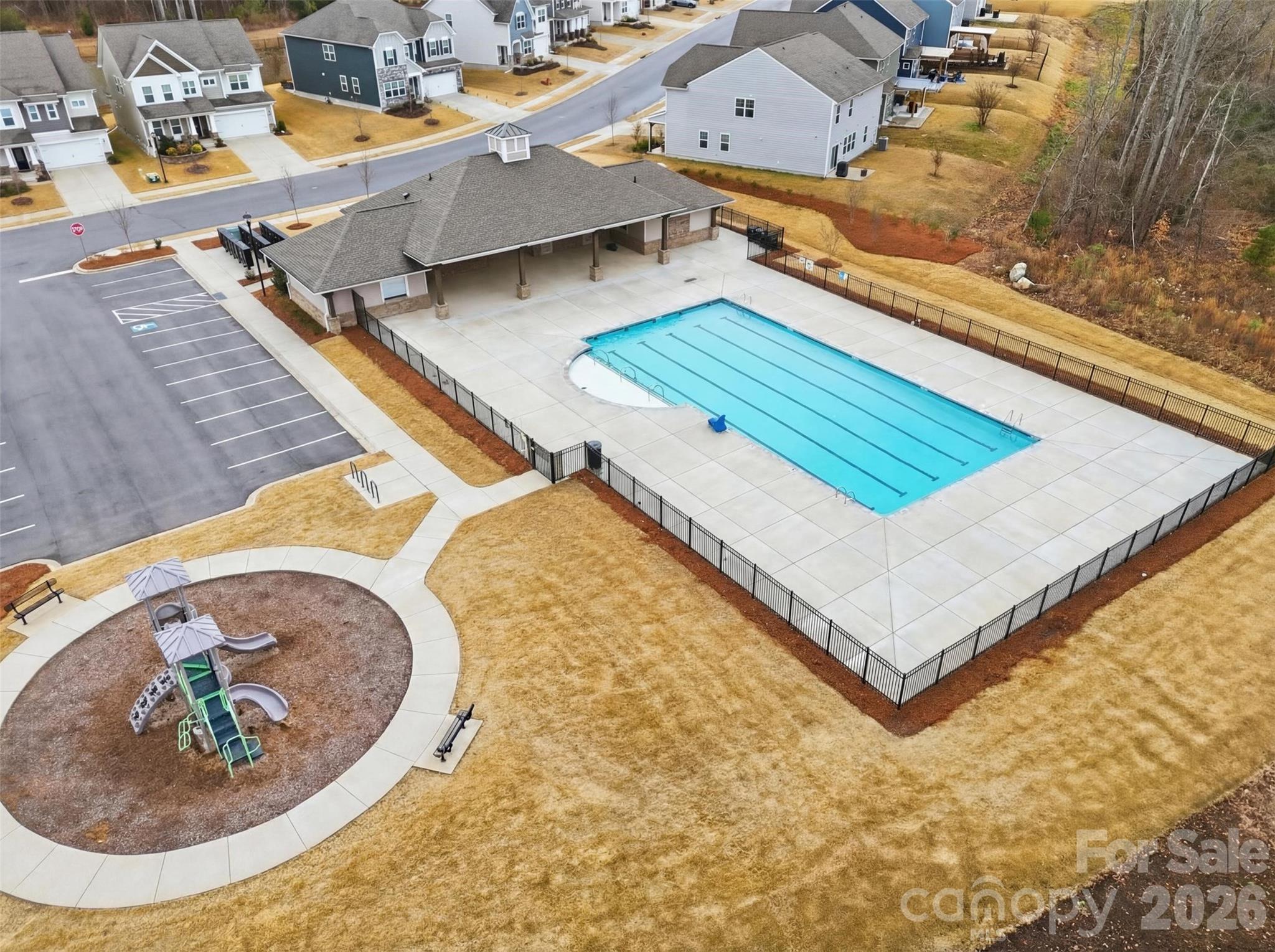 6029 Chelsea Oaks Ridge Fort Mill, SC 29708 - Photo 29 of 33 an aerial view of a house with a swimming pool