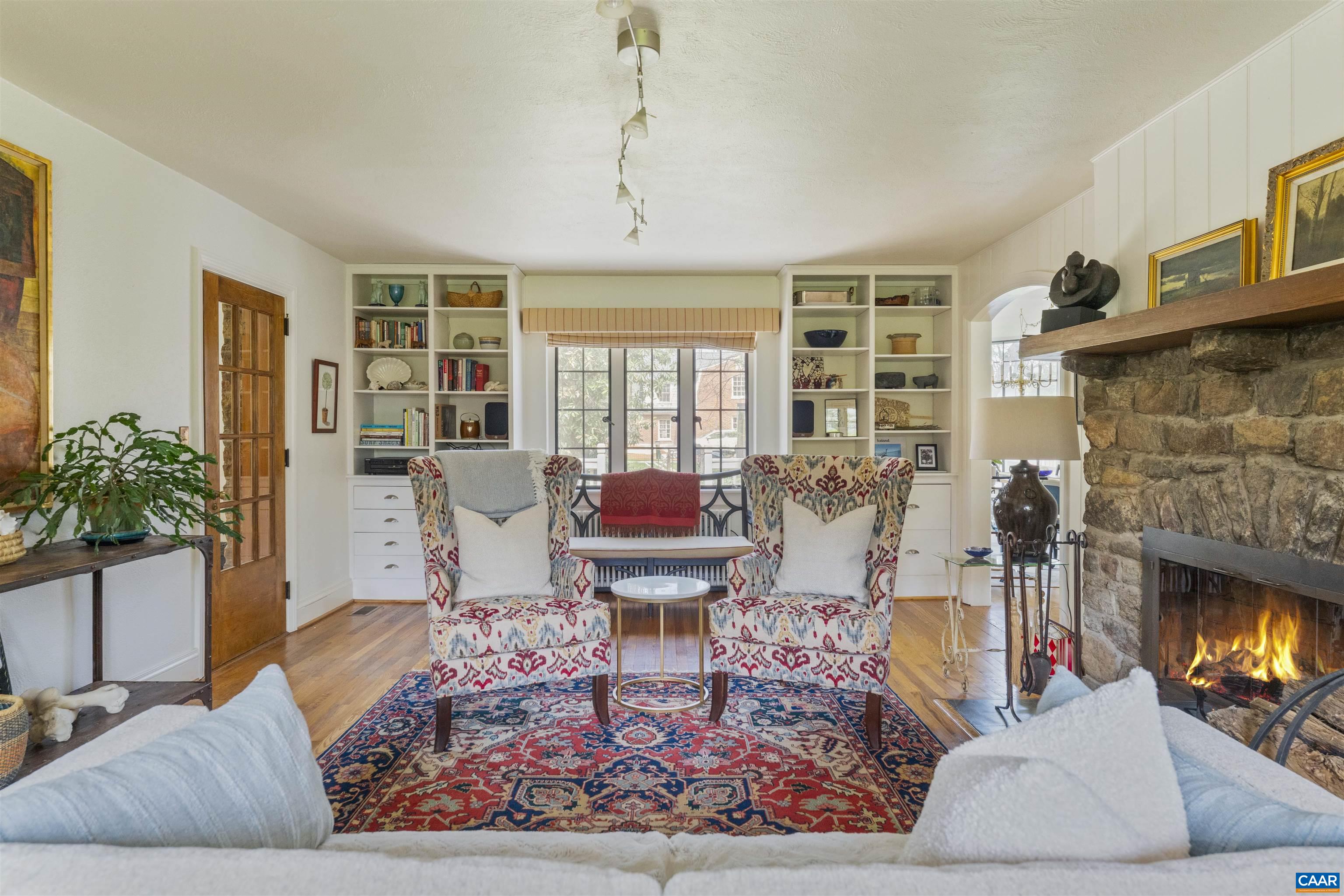 1917 Thomson Road Charlottesville, VA 22903 - Photo 4 of 45 a living room with furniture and a fireplace