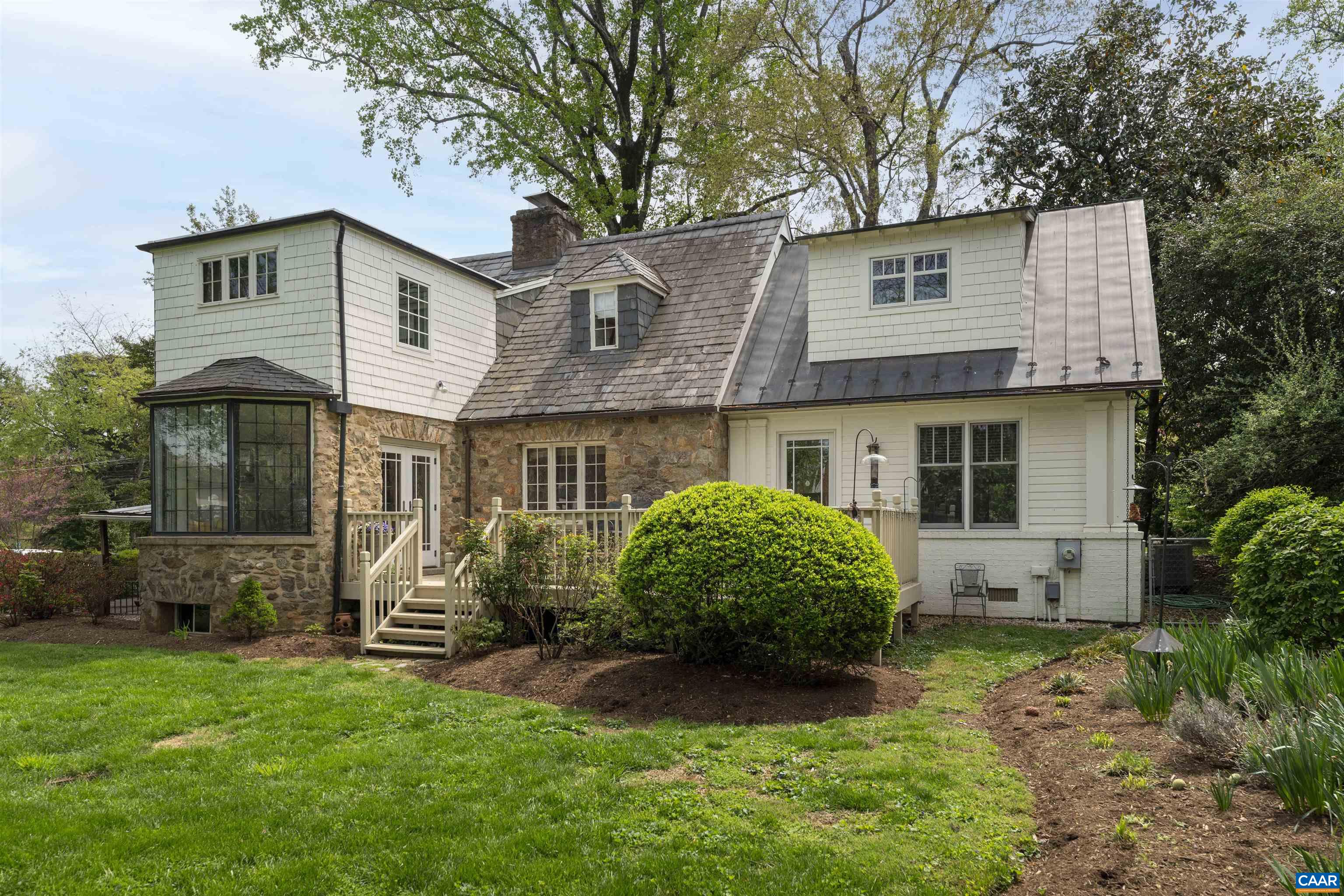 1917 Thomson Road Charlottesville, VA 22903 - Photo 42 of 45 a view of a house with a yard and plants