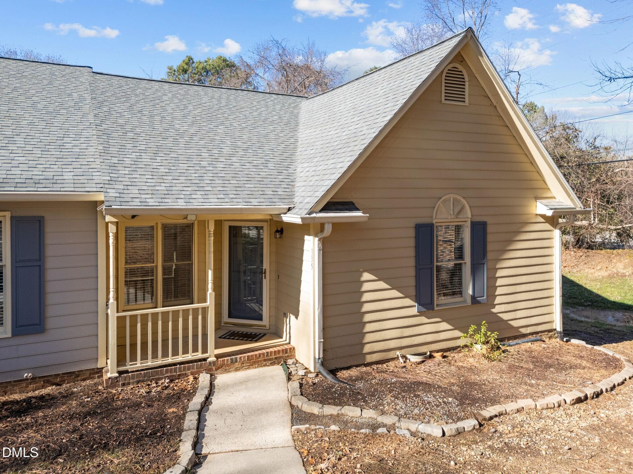 135 Boldleaf Court Cary, NC 27513 - Photo 1 of 27 a front view of a house with a yard