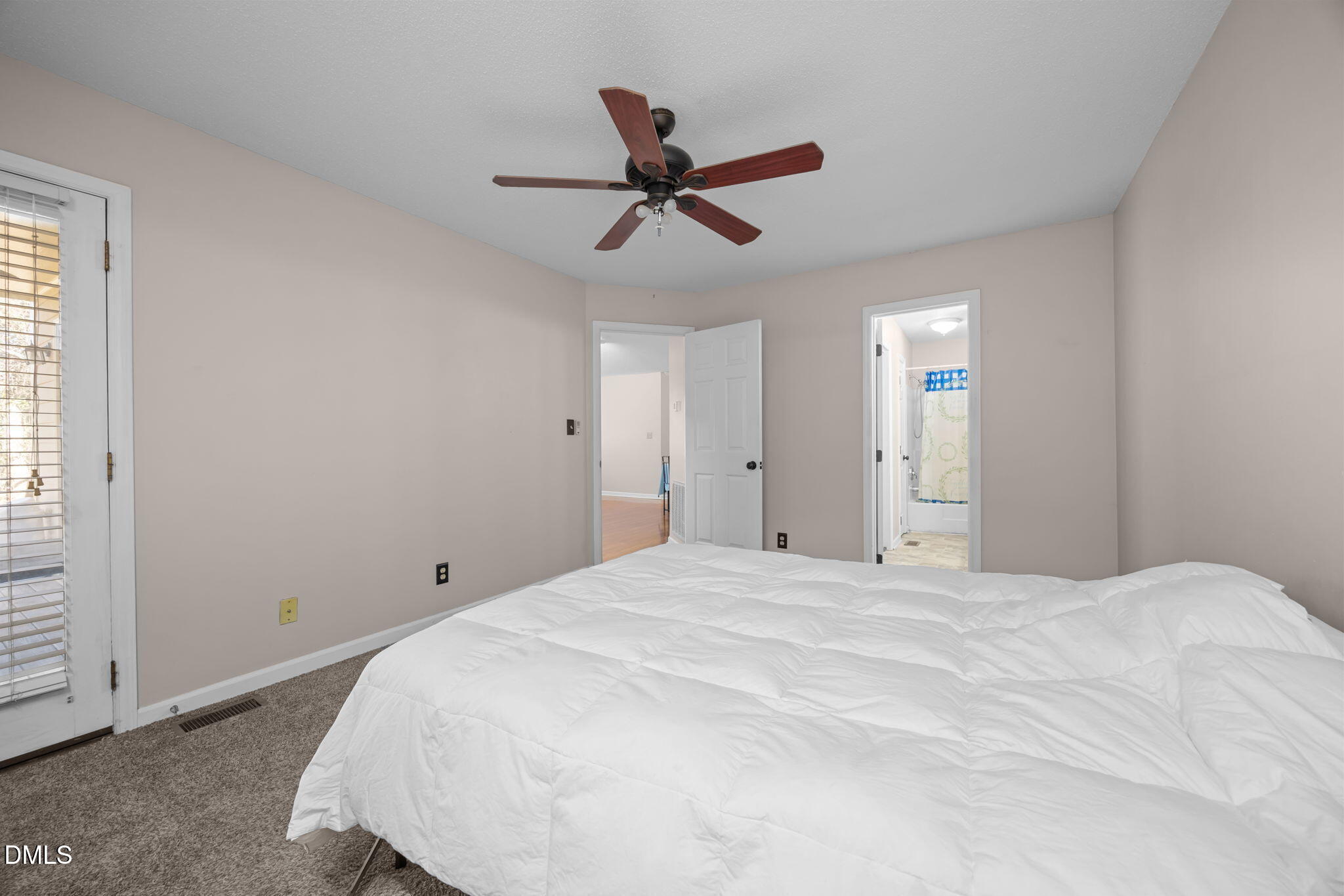 135 Boldleaf Court Cary, NC 27513 - Photo 13 of 27 a bedroom with a bed and a window