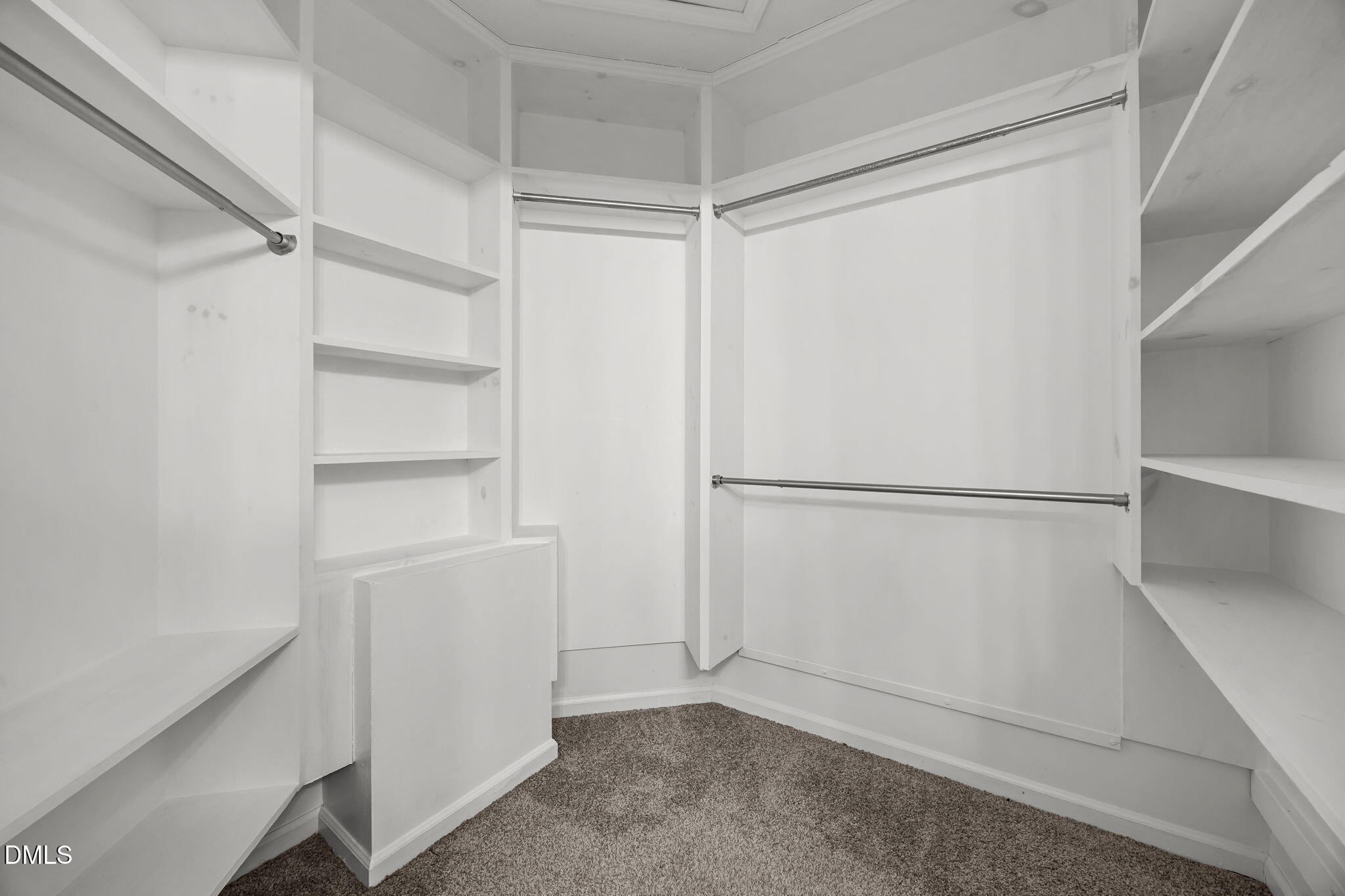 135 Boldleaf Court Cary, NC 27513 - Photo 20 of 34 a view of an empty walk in closet