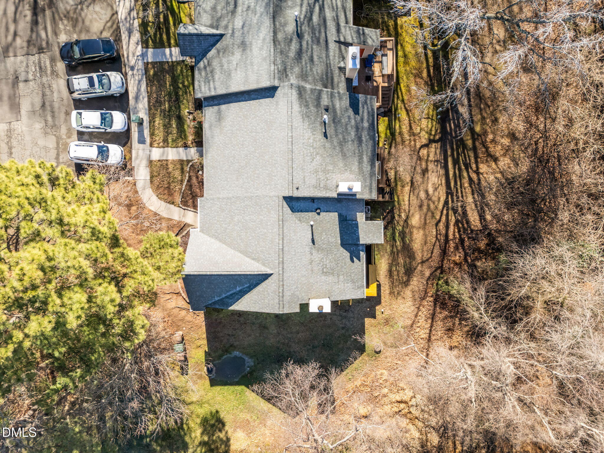 135 Boldleaf Court Cary, NC 27513 - Photo 25 of 27 a view of a house with a yard