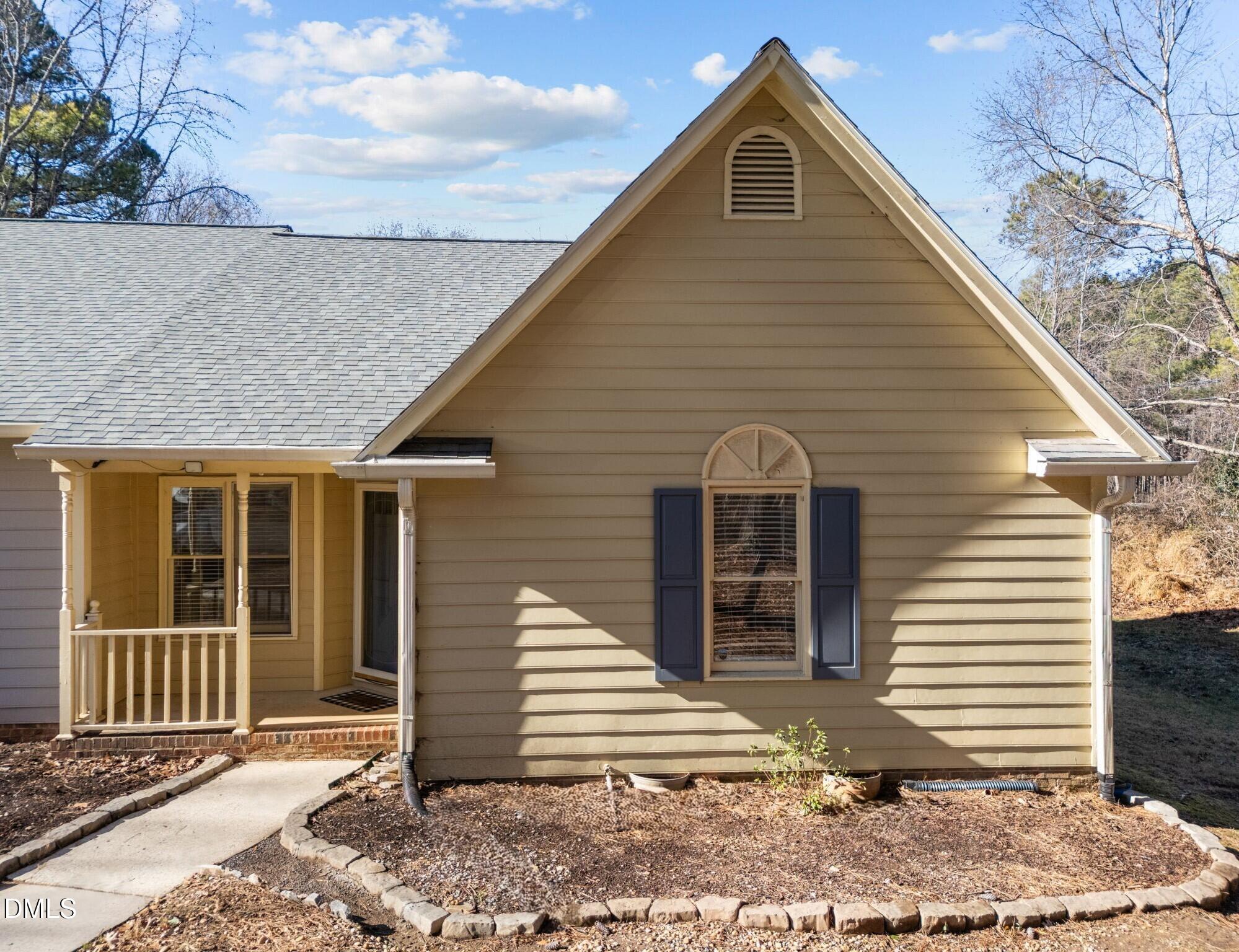135 Boldleaf Court Cary, NC 27513 - Photo 31 of 34 a front view of a house with a yard