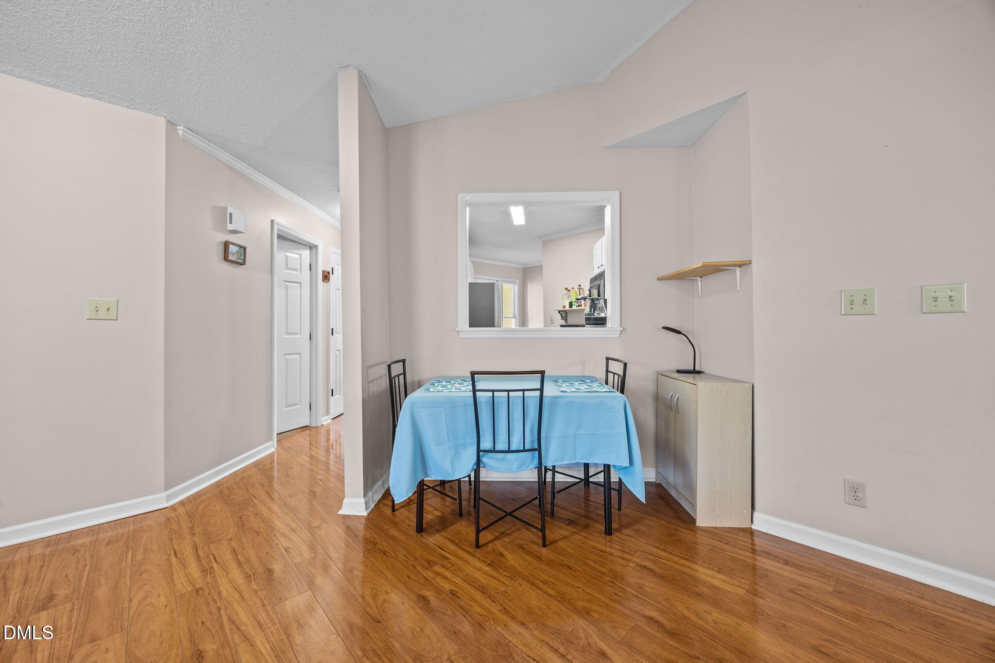 135 Boldleaf Court Cary, NC 27513 - Photo 9 of 34 a view of a room with furniture and wooden floor