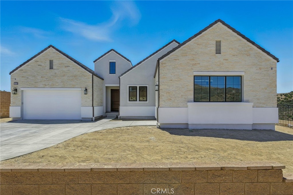 11919 Red Hawk Lane Porter Ranch, CA 91326 - Photo 1 of 1 Front Elevation: Silverado Modern Farmhouse - Ridge Collection at Bella Vista - Photo of Homesite 59. Home is still under construction.