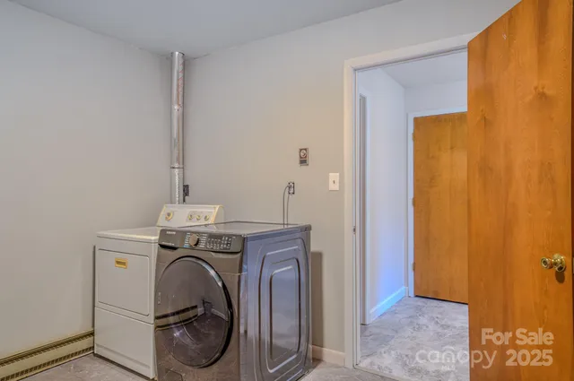 a utility room with dryer and washer