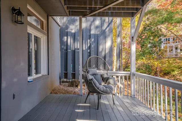 a view of balcony with furniture
